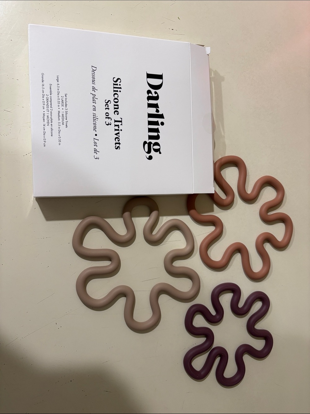 Darling Silicone trivet set of 3. New in box.